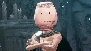 A portrait image of a bear chested man, who has a dark rope draped around him pinned at the right should by a circular brooch. The figure has his arms crossed and on his head is an upturned terracotta pot with patterning around the rim and base, narrow crack where a mouth might be and two small circular eyes holes.