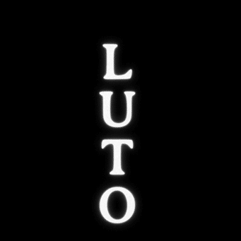 A black background with white lettering running down the centre that reads 'LUTO'